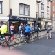 Cyclists on their bikes waiting to set off on a ride from Outdoor Traders shop on the High Street