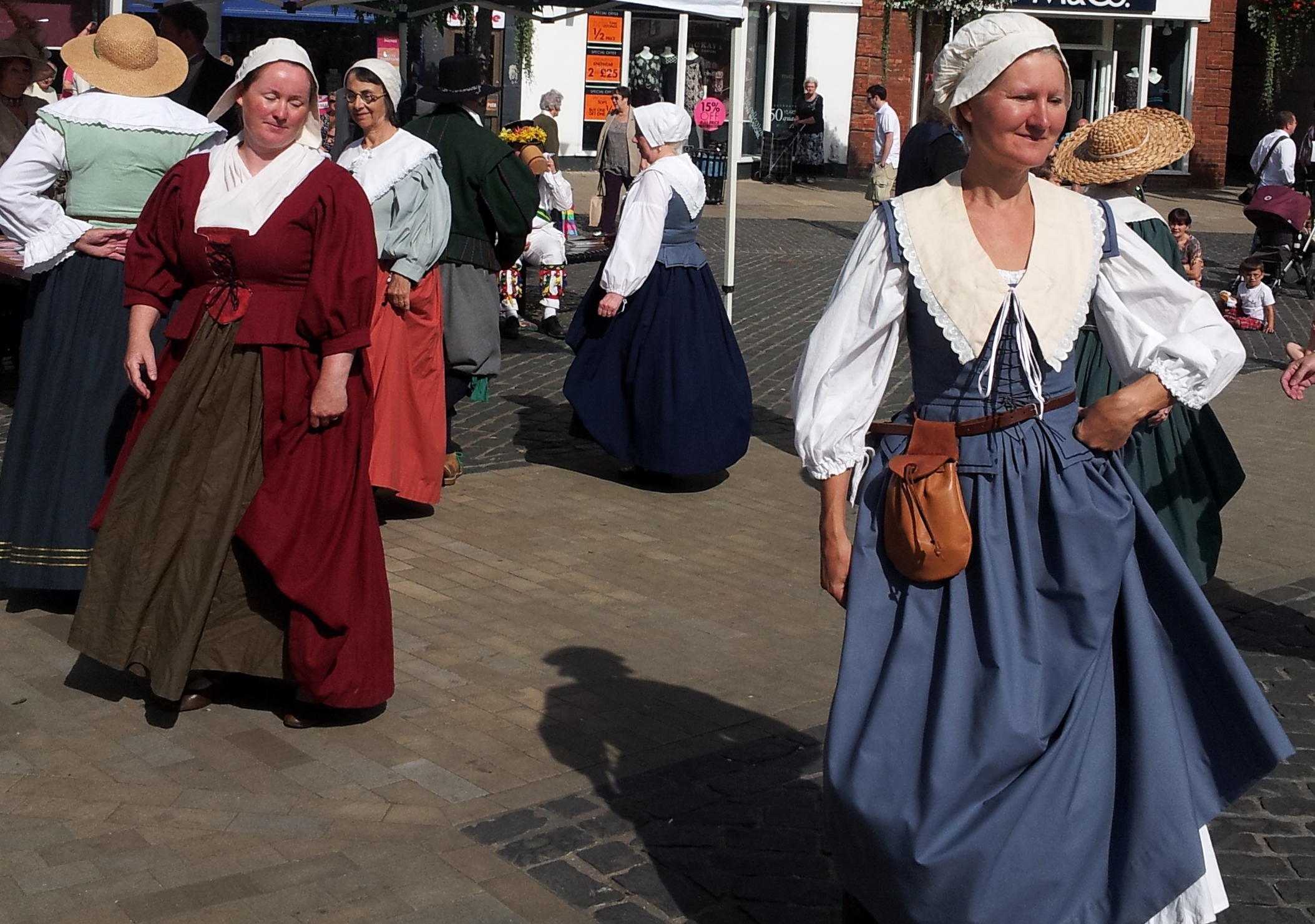 Sixteenth century costumed dancers in the Market Place